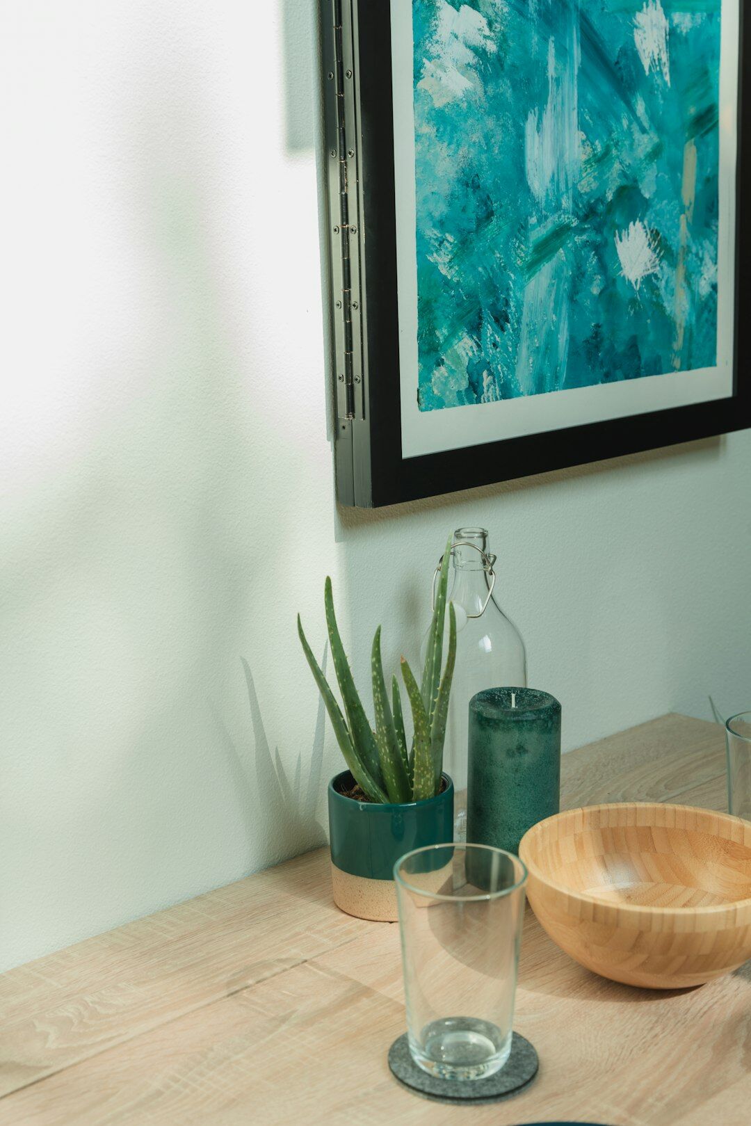 Colleagues reviewing photography prints at a wooden table